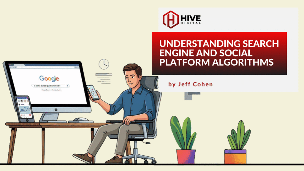 Man sitting at desk in front of computer with mobile device in hand